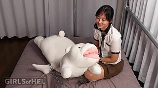 chained asian cutie vibes her shaved pussy to squirting orgasm