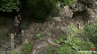 i'm tied up tight while this crowd bangs my busty body outdoors