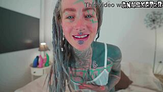 whoa this heavily tattooed goth girl with piercings fucks herself silly on huge dildo in bed