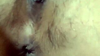 indonesian girl fingers her swollen pussy