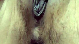 indonesian girl fingers her swollen pussy