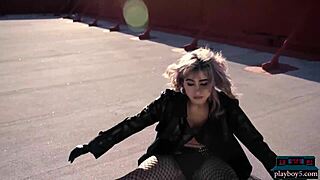 Latina babe Mia Valentine bares big natural tits stripping nude on rooftop