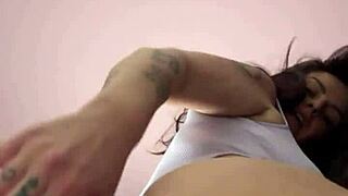 Watch this hot brunette milf shake her massive curvy ass and big tits like a total domme!