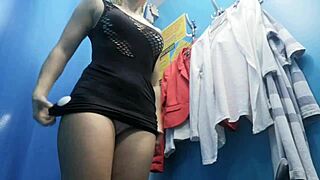 russian girl slips into changing room unaware of cam catching her big boobs and hard nipples
