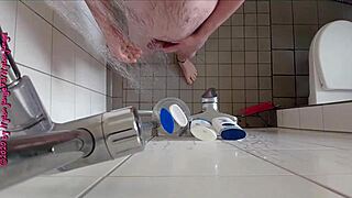 naughty german amateur pisses wildly in steamy bathroom shower on toes