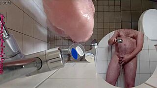 naughty german amateur pisses wildly in steamy bathroom shower on toes