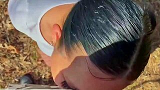 Asian babe gags on huge cock outside!