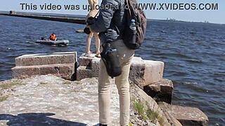 Naked beauty teases on the dock in public