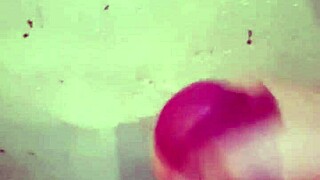 guy strokes monster cock to cum in steamy shower bath