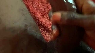 Jerking huge black cock cum covered in bedroom