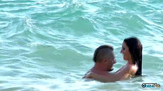 tourists sneak doggystyle fuck on nudist beach when alone