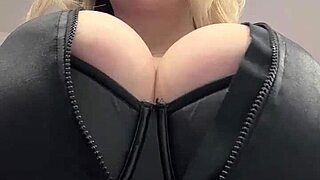 whoa these juicy big natural tits are bursting right out of that tight leather oh man