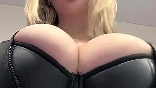whoa these juicy big natural tits are bursting right out of that tight leather oh man