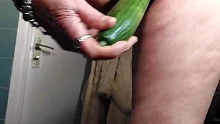 Grandma's hairy pussy stuffed deep with fresh cucumber