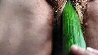 Grandma's hairy pussy stuffed deep with fresh cucumber