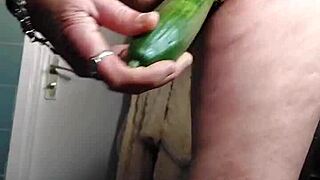 Grandma's hairy pussy stuffed deep with fresh cucumber