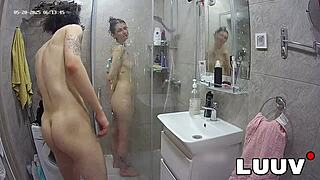Luuv's webcam couple flashes tits in amateur shower routine