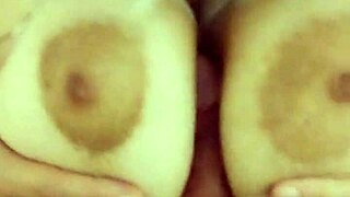 amateur wife shows off her massive jiggling tits