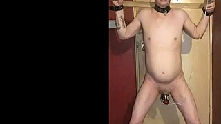 Bisexual dude anal hooked cuffed takes electro cock torment on cam!