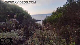 Cliffside Tease Reveals Curves During Seaside Oral Play