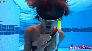 i'm skinny asian with huge buttplug swimming poolside fingering my gaping ass to pussy outdoors