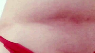 wow she's playing with her thong on webcam!