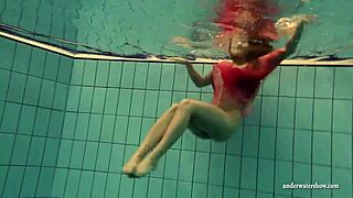 Hey big tits Silvie dive in pool bikini slips to flash hairy pussy underwater