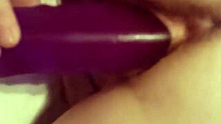 wife stretches pussy wide open with deep purple dildo before jizz explosion