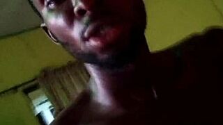 in the dark, she deepthroats his cock passionately