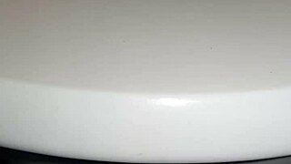 gretala makes noisy sounds from the toilet