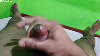 Blockdilo strokes massive black cock solo handjob