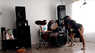 Hey, watch her strip and shake that huge ass to our drums?