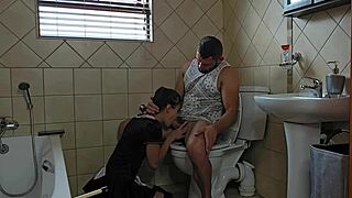 petite milf slurps cock desperately on filthy toilet