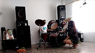 Hey, watch her strip and shake that huge ass to our drums?