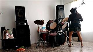 Hey, watch her strip and shake that huge ass to our drums?