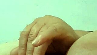 abuela stuffs her mature colombian pussy with big cucumber in bed