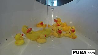 sexy blonde nadia slips into bath playing with big tits pussy and rubber duckies
