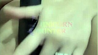 Watch this cute Brazilian stuff black dildo deep in her tight pussy!