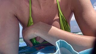 italian milf artemisia love flashes juicy tits in micro bikini at beach