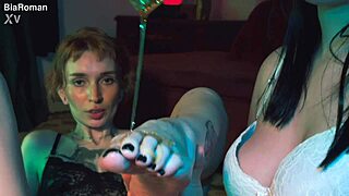 redhead femdom makes brunette lick her honey feet in lesbian 3some