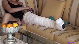 Fetisch-concept com punishes blonde teen in cast leg on stairs and outdoors