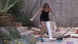 Fetisch-concept com punishes blonde teen in cast leg on stairs and outdoors