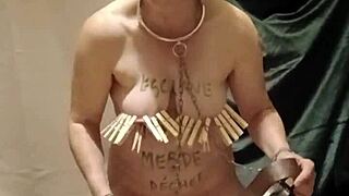 Female slave clamped belted and pissed on during harsh indoctrination session