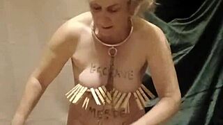 Female slave clamped belted and pissed on during harsh indoctrination session