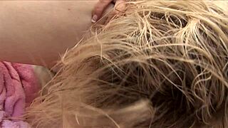 lesbian lovers move from shower fingering to couch pussy licking and riding