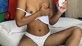 innocent petite 18+ films her tight pussy masturbation on phone while we spy every move