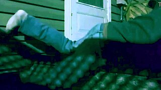 nighttime steps stretch reveals lattice-shadowed ass and legs in time-lapse glow