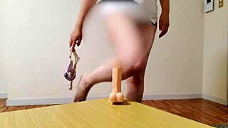 A chubby married Japanese bride masturbates wildly with dildo in full bedroom video