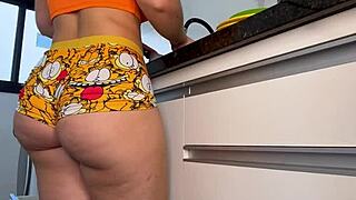 big ass housewife teases juicy curves bending over in tight shorts while making dinner at home