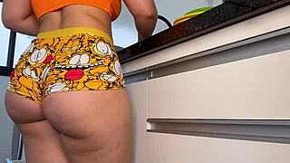 big ass housewife teases juicy curves bending over in tight shorts while making dinner at home